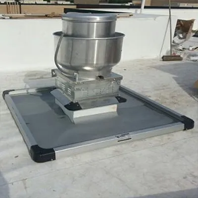 Rooftop grease containment system